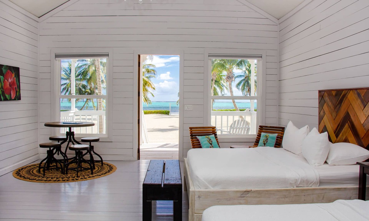San Pedro House | Beachfront Bungalow #2 on Coconut Farm- Seaclusion