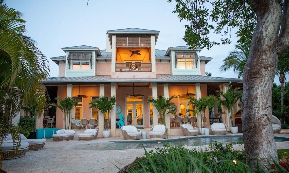 Dunmore Town House | Buttonwood – Luxury Villa on Bay, Private Dock, Oceanside Furniture, Pickleball