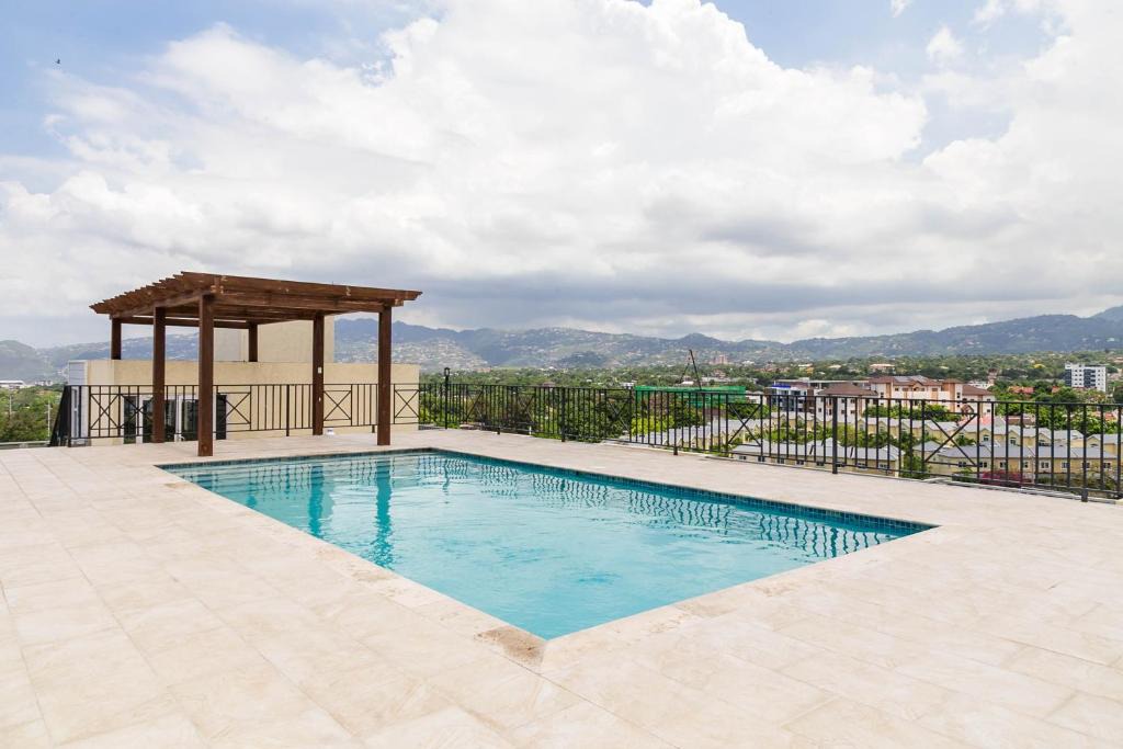 Barbican Apartment | Choose To Be Happy at Twenty 2A 2-Bedroom w Pool
