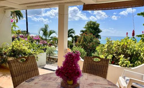 Dickenson Bay Apartment | Cozy sea view apartment with beach at walking distance and pool