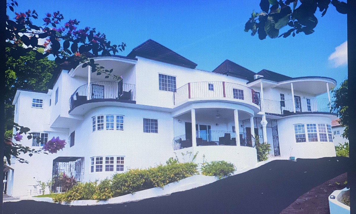 Tower Isle House | Elegant Estate Home Ocean/view . balconies Garden/pool view lush greenery