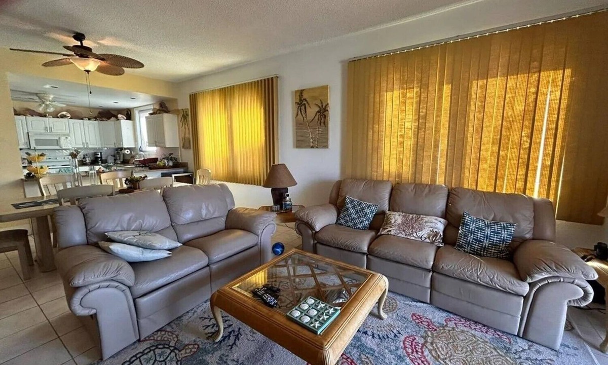 Bahamia West House | It's Island Time! Large condo with dock and a view in the heart of Freeport.