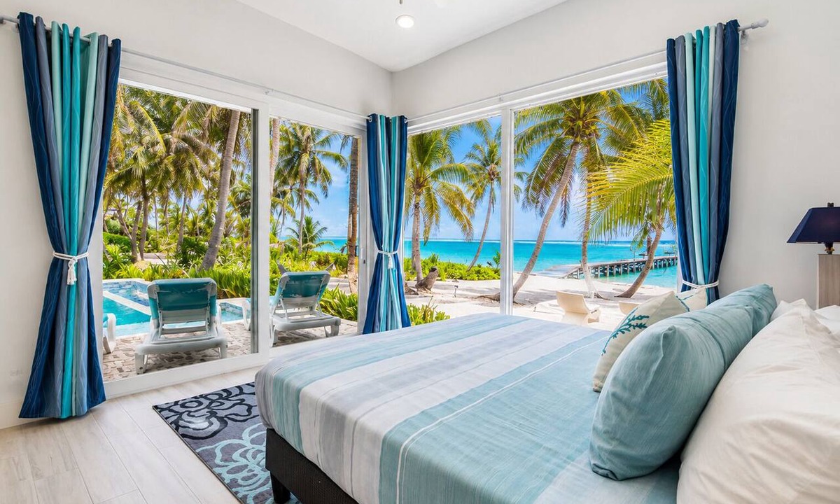 San Pedro House | Luxury beachfront vacation rental on Ambergris Caye with a private pool, rooftop lounge, private casita, direct beach access, and full-service concierge. Perfect for families, couples, and group getaways in Belize.