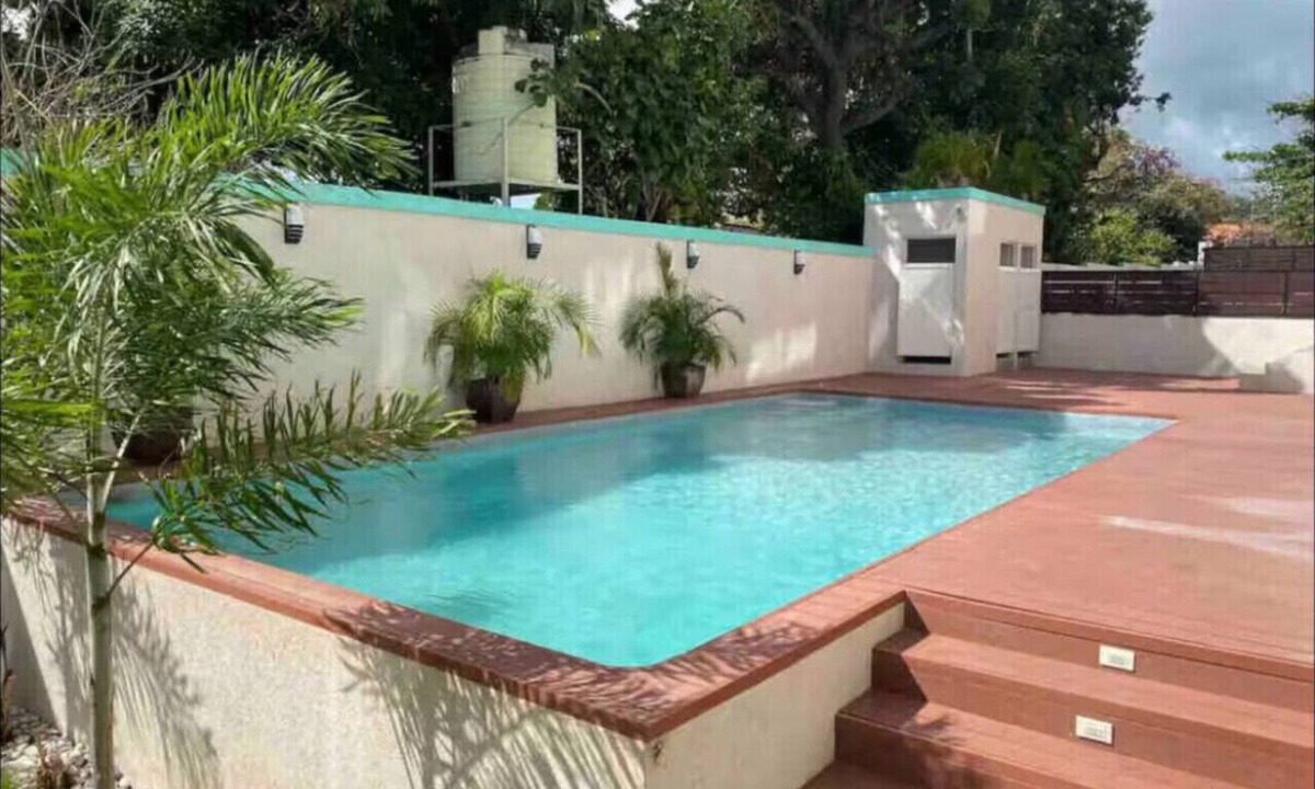 Saint Andrew Apartment | Modern 2BR Condo | Pool | Prime Kingston 6