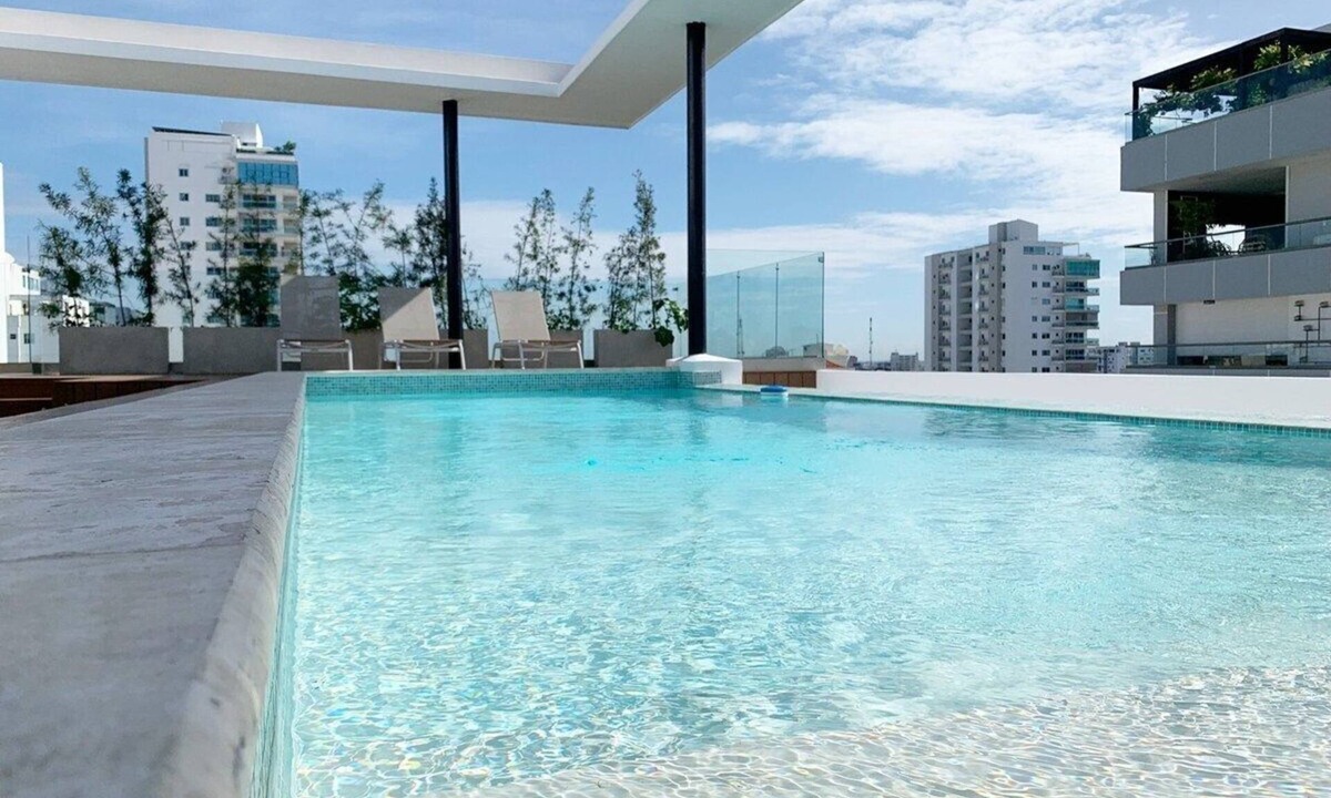 Evaristo Morales Condo | New-Pool-Comfy-CityCenter-WiFi-AC-Safe-YellowKey
