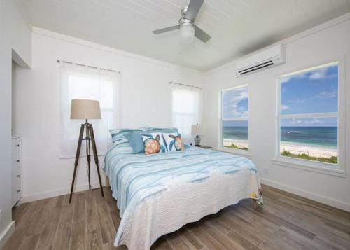 Governor's Harbour Villa | Oceanfront Haven: Elegant Estate with Private Deck