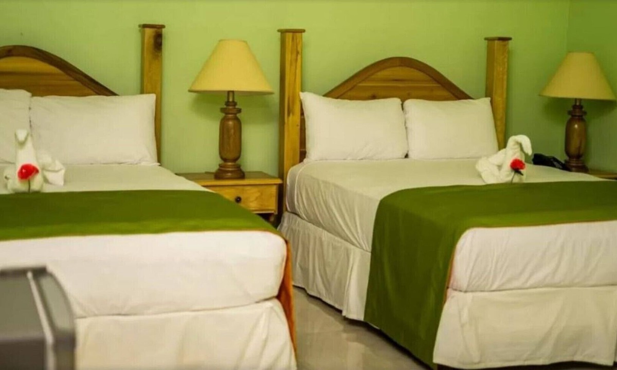 Runaway Bay Resort | Premium triple, multiple beds, garden views