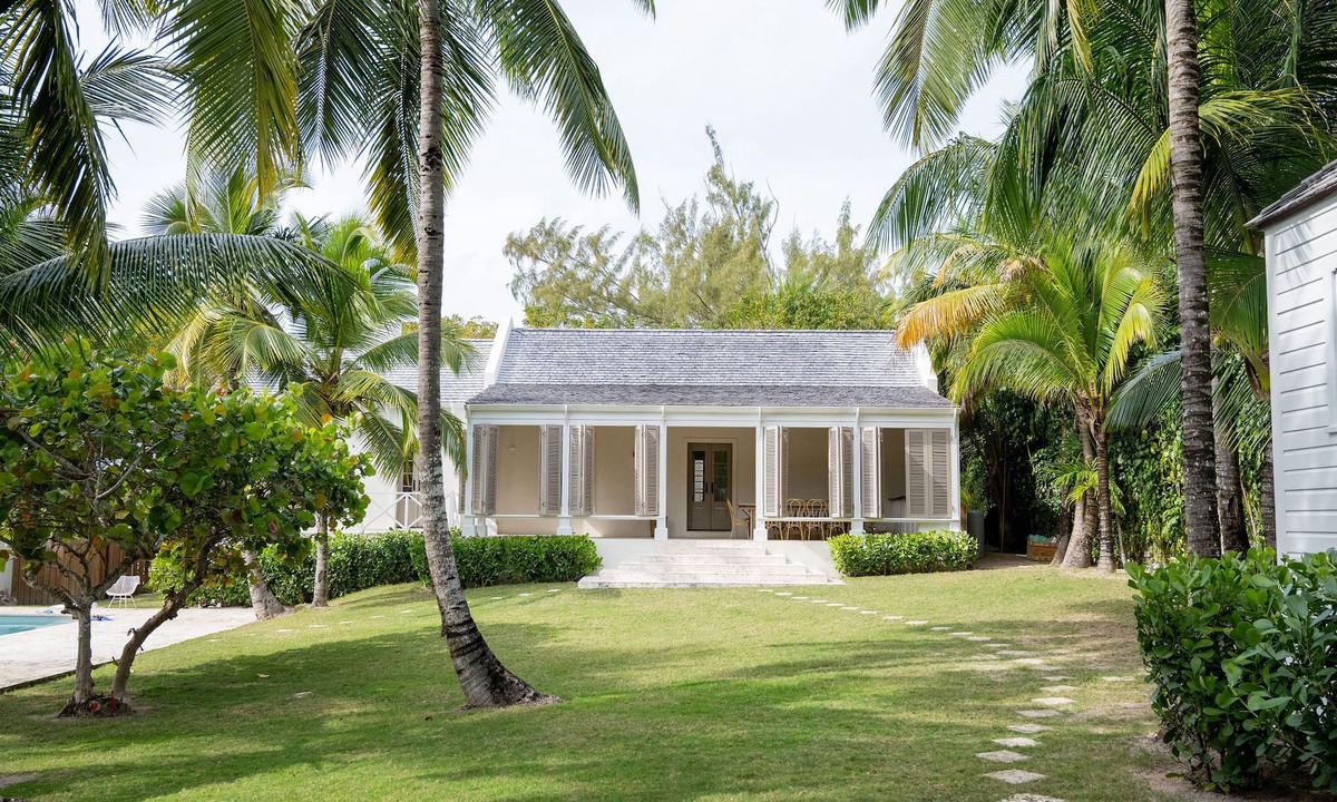 Dunmore Town House | Private home steps from the pink sand of Harbour Island w pool and guest cottage