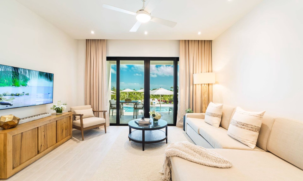 Long Bay Resort | Relax on a Juliette balcony with an ocean & pool view!