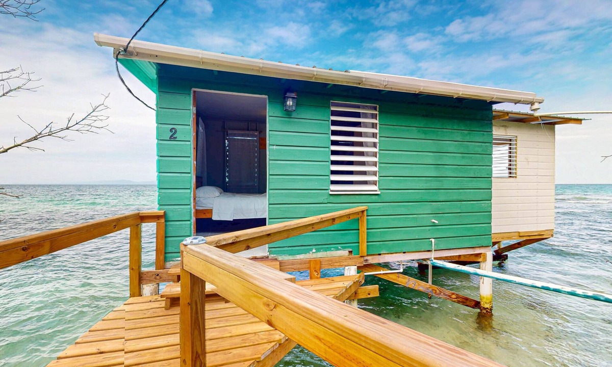 Sittee Point Apartment | Rustic oceanfront cabin w/overwater kitchenette, sea views & private deck