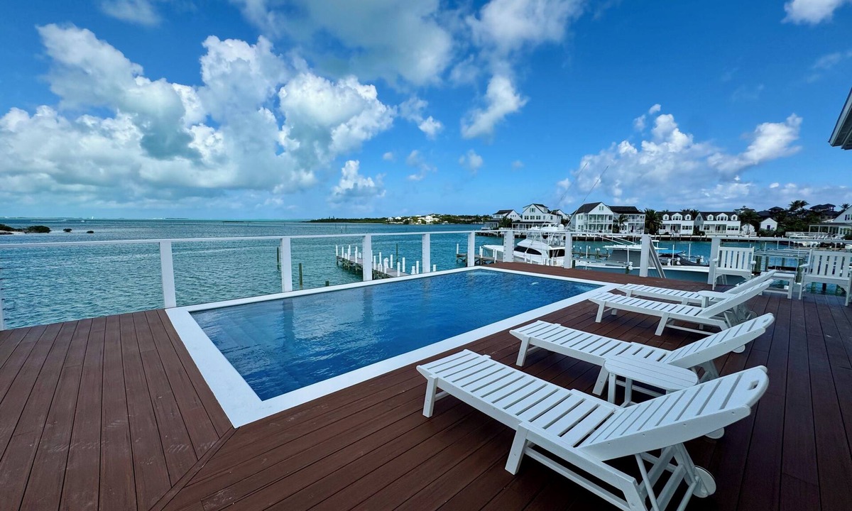 Hope Town Villa | Three Little Birds: Waterfront Home-Private Pool & Dock Perfect For Boaters!