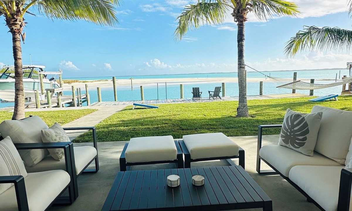 Treasure Cay House | Waterfront 5BR Oasis - 50’ Private Dock - 6-Seater Golf Cart Option