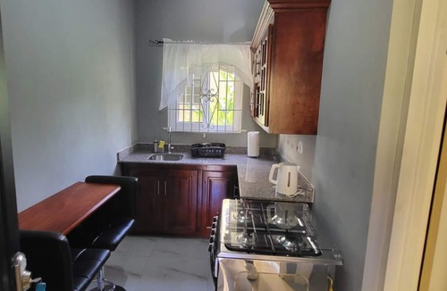 Runaway Bay House | 1 Bedroom Suite (with Pool view &Private Balcony)