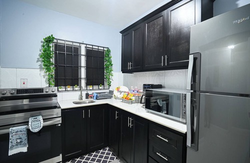 Eden Gardens Apartment | 2-bedroom apartment in New Kingston with cool AC breeze- Château de Luxe