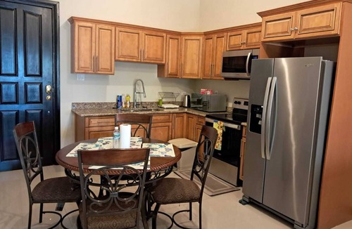 Saint Andrew Condo | 2-bedroom condo in delightful Kingston with cool AC