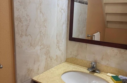Camperdown House | 2-bedroom townhouse in charming Kingston & St. Andrew with Wifi, AC, Wall Fans