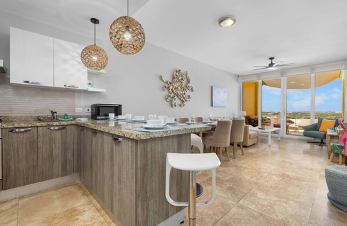 Boegoeroei Condo | 2 bedrooms and 2 baths in a tropical setting. Amazing outdoor spaces and a very convenient location. Less than 2 miles from stunning Eagle Beach and the High-rise hotel district with shopping, casinos and restaurants.