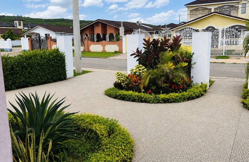 Falmouth Apartment | 2BR Garden Suite – Minutes from a Glowing Lagoon