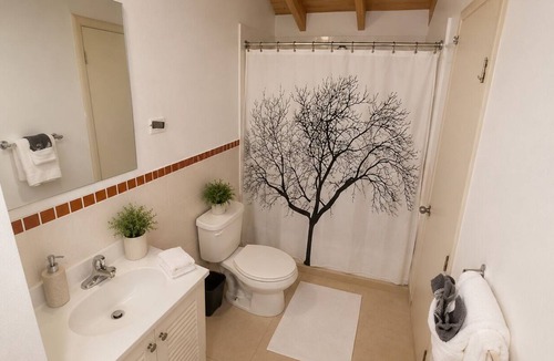 Falmouth Apartment | 2BR Garden Suite – Minutes from a Glowing Lagoon
