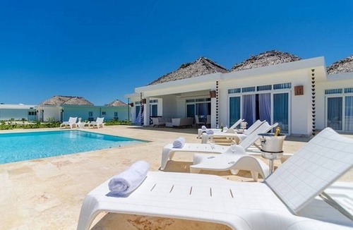 Playa Chiquita Villa | 4BD Guest-friendly villa on a sandy beach, private pool & golf cart, gym/tennis!