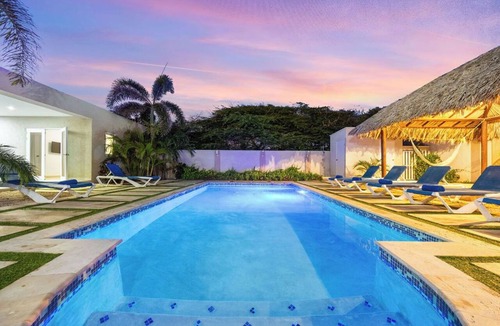 Palm Beach House | 7BR Oasis in Paradise on One Happy Island
