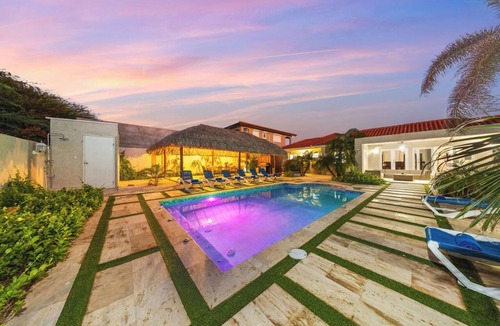 Palm Beach House | 7BR Oasis in Paradise on One Happy Island