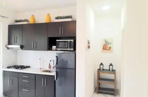 Urbanizacion Tavarez Condo | A luxurious and peaceful place with AC, free WIFI, private patio, and balcony!