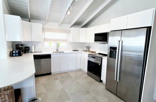 Old Trees Bay Apartment | A True Slice of Paradise in Paynes Bay, Newly renovated upper level apartment.