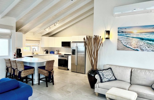 Old Trees Bay Apartment | A True Slice of Paradise in Paynes Bay, Newly renovated upper level apartment.