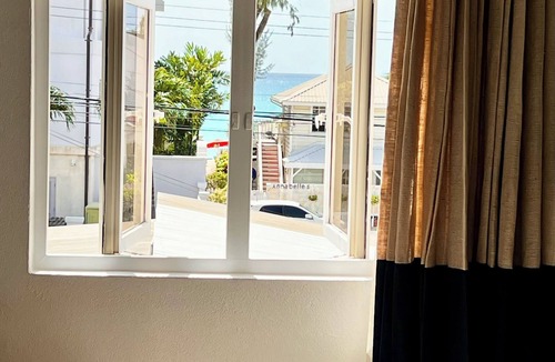 Old Trees Bay Apartment | A True Slice of Paradise in Paynes Bay, Newly renovated upper level apartment.