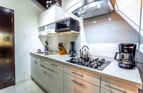 Boroncana Villa | Apartment With Charming Patio+ BBQ Near Beach! Free Util's
