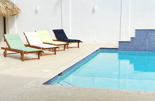 Palm Beach Apartment | Beach Walk 1 · Beach Walk Apartment 1 - Poolside