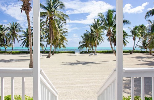 San Pedro House | Beachfront Bungalow #2 on Coconut Farm- Seaclusion