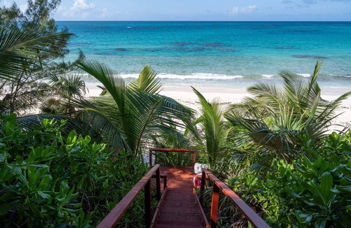 North Palmetto Point House | Beachfront Cottage with 50 Mile Ocean View and Pool Access