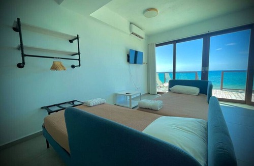 Stella Apartment | Beachfront Family Suite with Balcony