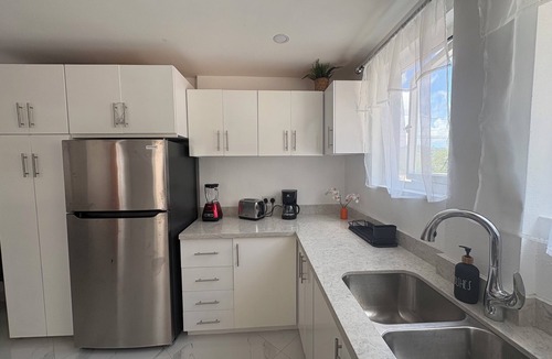 Bois d'Orange Apartment | Beautiful Modern Coral Apartment near the beach, w/rooftop terrace for relaxing.