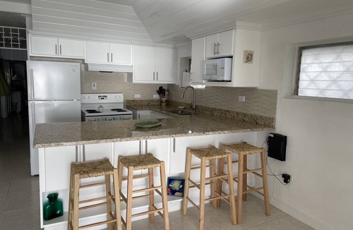 Spring Garden Apartment | Best Balcony On the Beach! Beachfront at It’s Best!