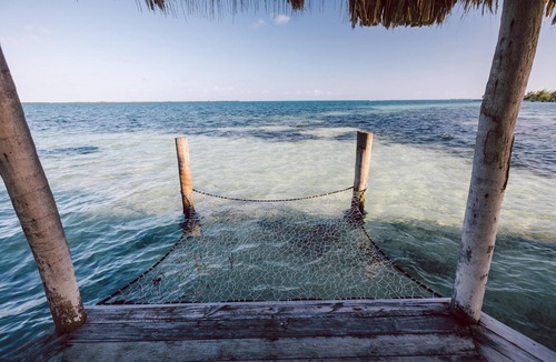 Thatch Caye Resort | Breezy Oceanfront Cabana w/Walk-In Shower & Private Rooftop Deck