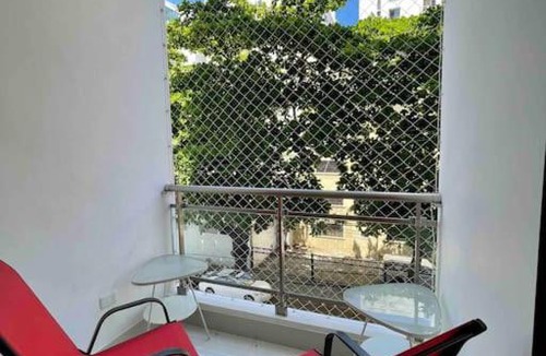 Ensanche Naco Apartment | Bright 1BR Apt, Private Parking, AC, Wifi, Balcony