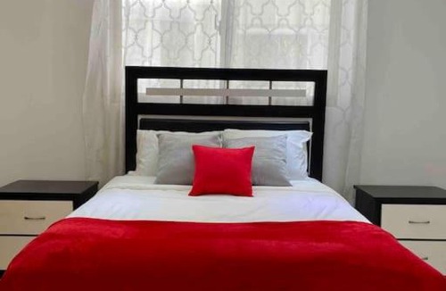 Ensanche Naco Apartment | Bright 1BR Apt, Private Parking, AC, Wifi, Balcony