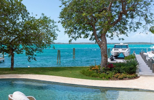 Dunmore Town House | Buttonwood – Luxury Villa on Bay, Private Dock, Oceanside Furniture, Pickleball
