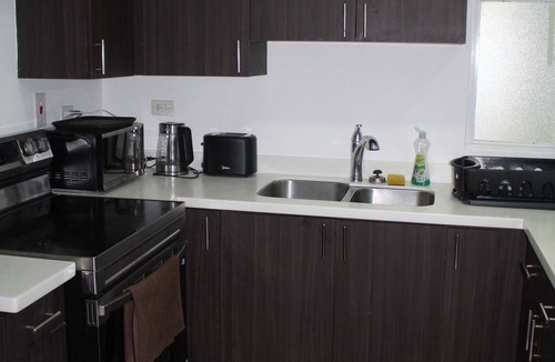 Eden Gardens Apartment | Charming 2-bedroom Penthouse apartment @The Bromptons New Kingston w/pool & gym