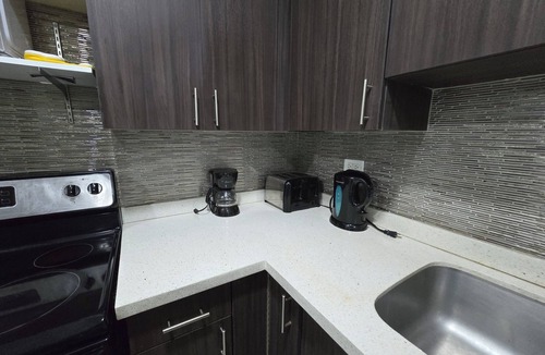 Eden Gardens Apartment | Charming 2-bedroom Penthouse apartment @The Bromptons New Kingston w/pool & gym