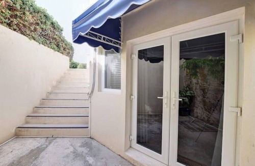 Paradise Island Condo | Charming condo near Atlantis, beach, and more!
