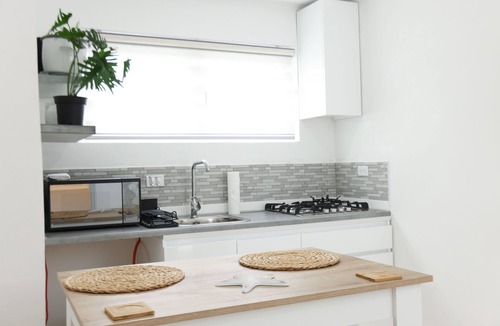 Lago Heights Apartment | Charming Retreat at Lelia