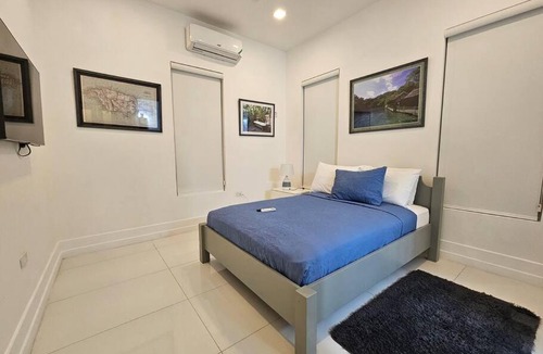 Barbican Apartment | Choose To Be Happy at The GAIA 2-Bedroom w Pool