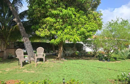 Nassau House | Comfort at Sandra's Garden Estate with air condition and wifi