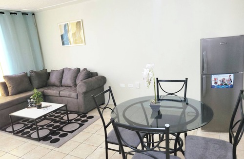 Saint Andrew Apartment | Cozy 1-bedroom apartment with AC and WiFi in central Kingston