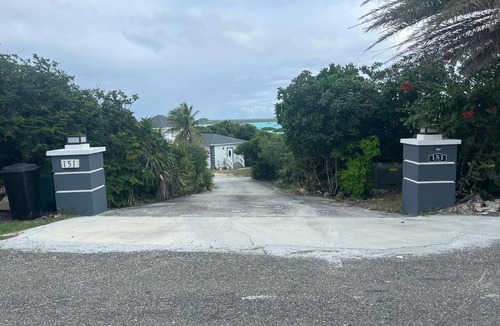 Ocean Point Apartment | Cozy 1bedroom apt in gorgeous Chalk Sound, w/water views/access in the backyard