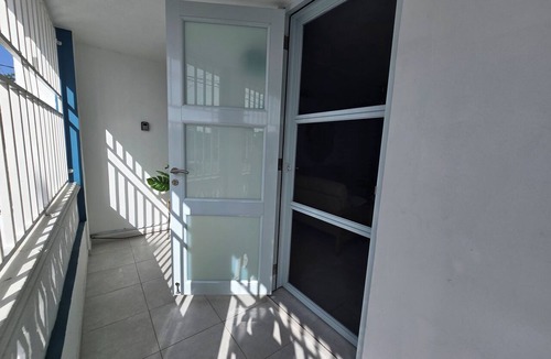 Palmas House | Cozy 3BR house with AC Parking Patio Centric Location Casa Jeyri